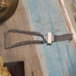 Nicole Statement necklace with silver tone 5 strand chain and creme pendant